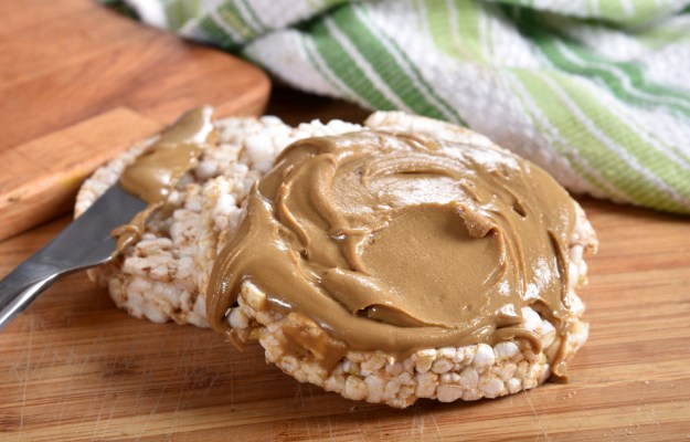 Rice Cakes covered in Almond Butter | Best Energy Pumping Pre-Workout Snacks